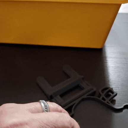 TOUCHDOWN FOLDING PHONE STAND: A PRINT-IN-PLACE FOOTBALL HELMET DESIGN