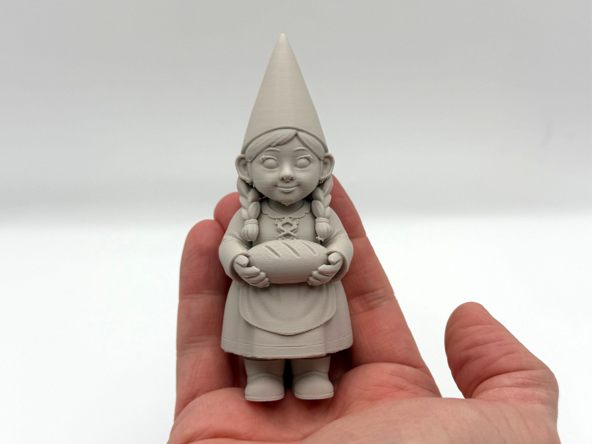 Female Gnome with Bread