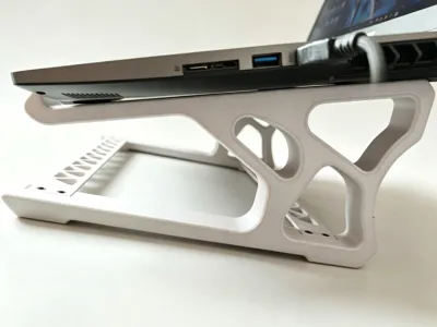 Laptop stand with keyboard storage