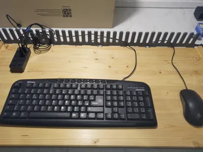 DeskTeeth - a desk lip with space for cables