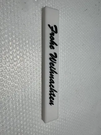 Klötzchen mit Schriftzug