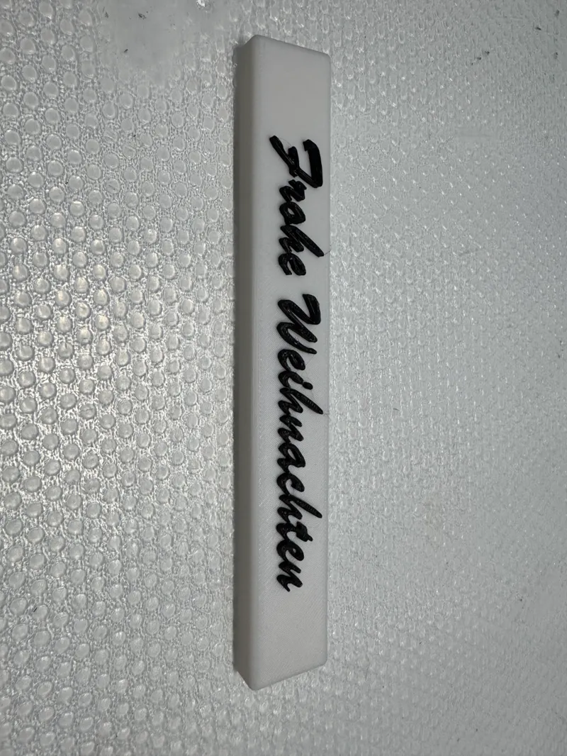 Klötzchen mit Schriftzug