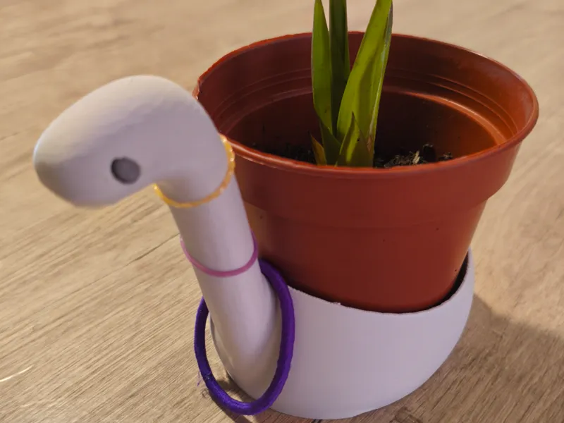 A-pot-osaurus plant pot holder hair band organizer
