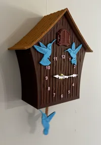 Plain clock with no decoration. Separate plate for roof.