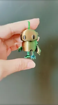 Robot articulé miniature porte-clés — photo 4
