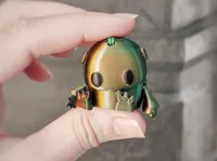Robot articulé miniature porte-clés — photo 1