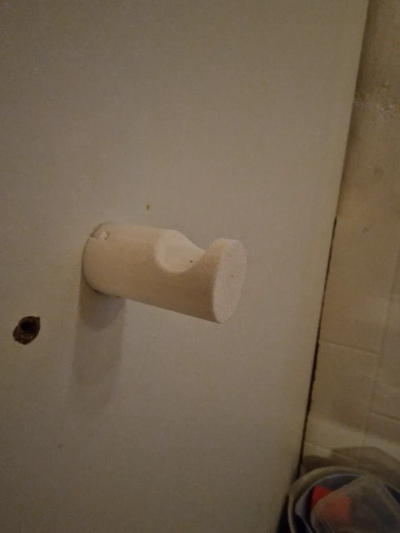 Wall hook, with hidden screw