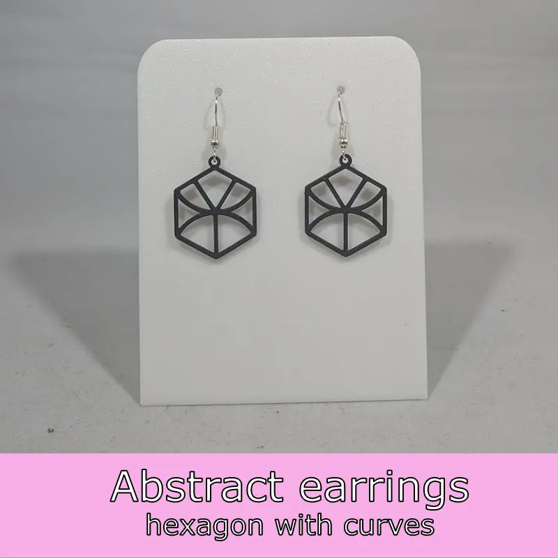 Abstract earrings - hexagon with curves view 2