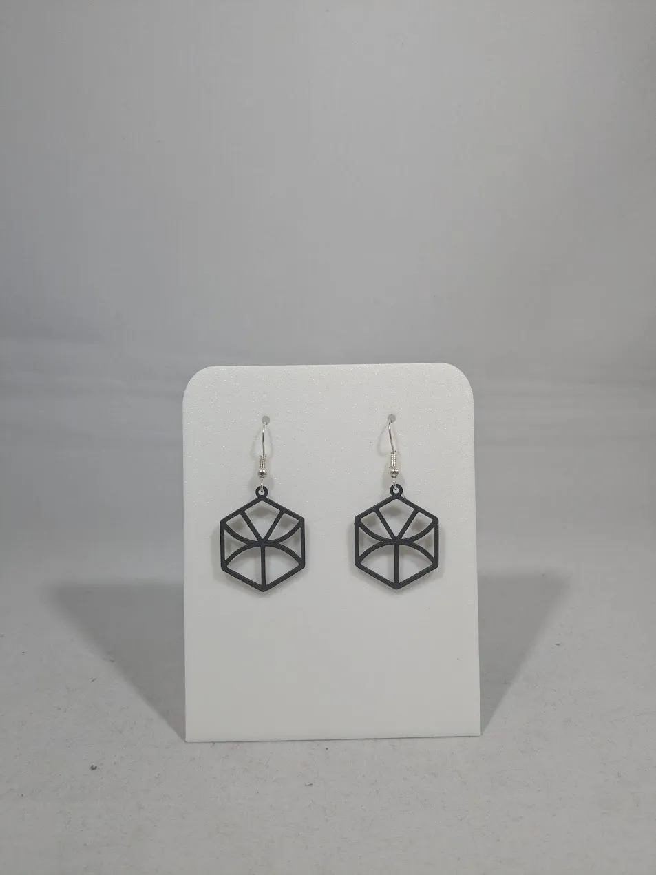 Abstract earrings - hexagon with curves view 3