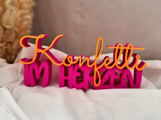 Konfetti im Herzen Schriftzug