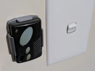 Glidermatic or Gliderol garage door remote bracket
