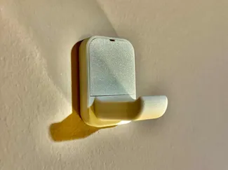 Single coat & bag hanger/hook, hidden screws