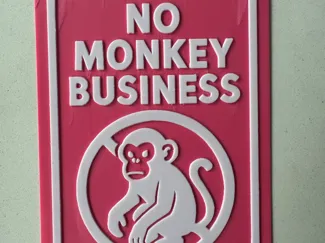 "No monkey business" sign