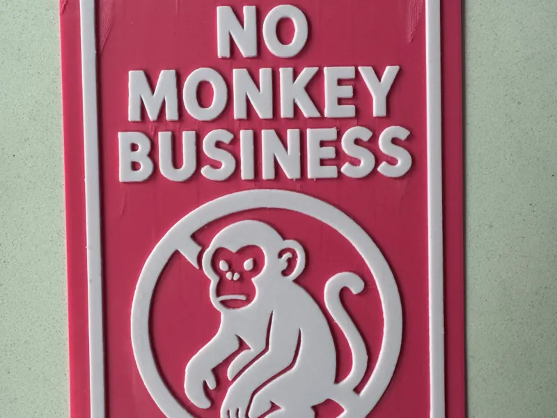 "No monkey business" sign