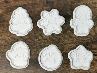 Christmas cookies cutters with stamps faces