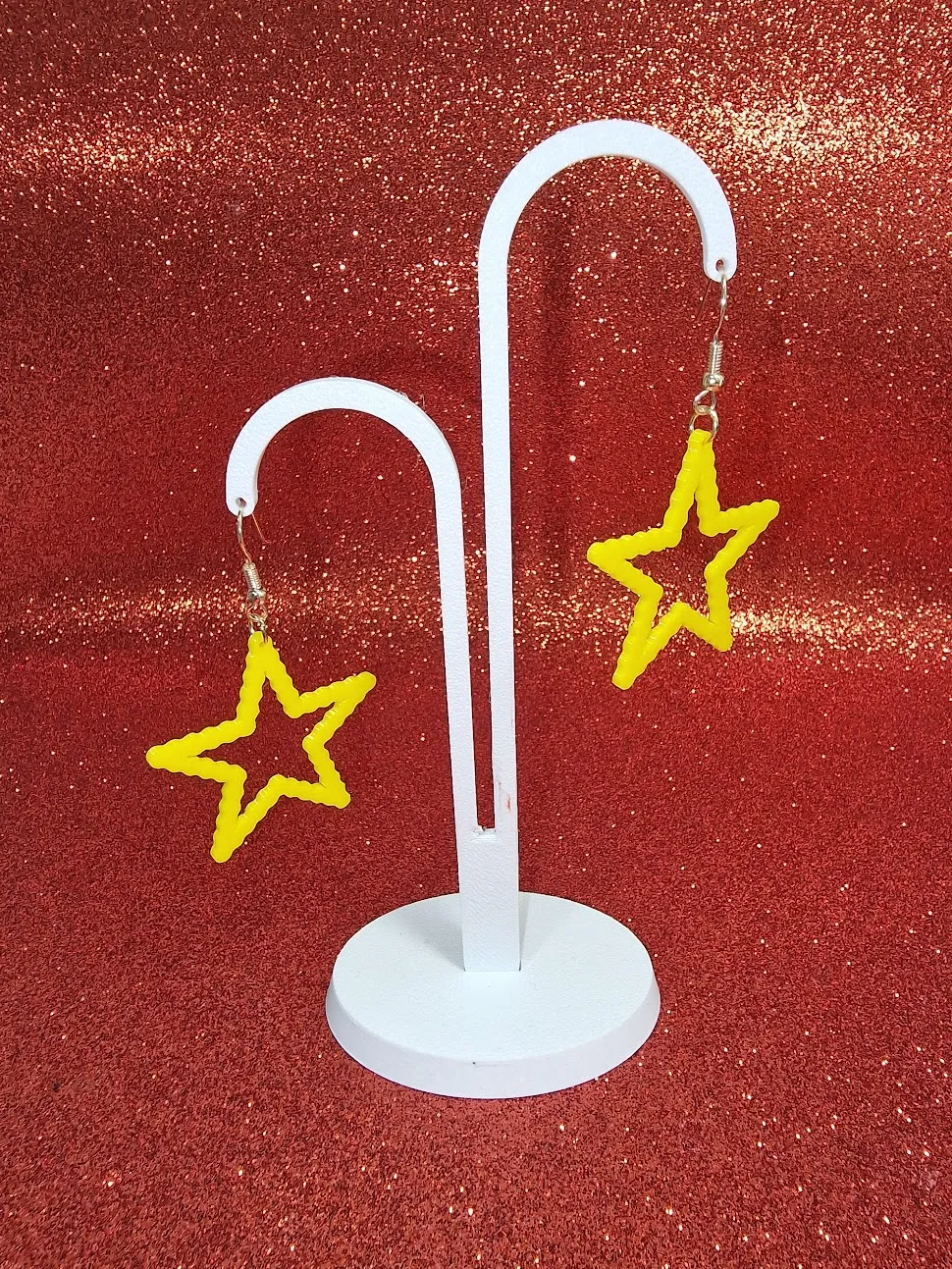 Rounded star earrings view 3