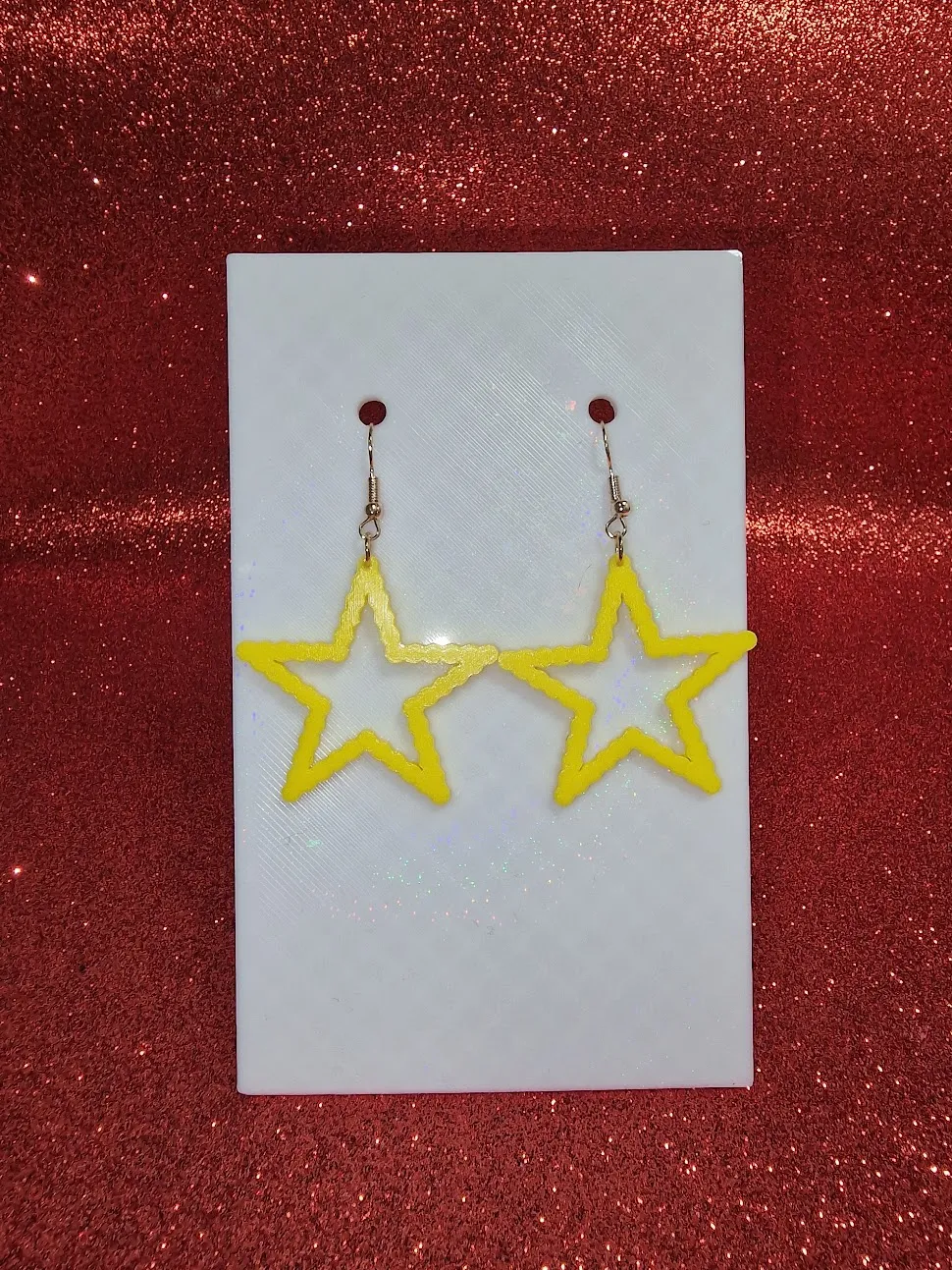 Rounded star earrings view 2