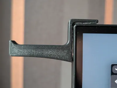 Monitor headphone holder