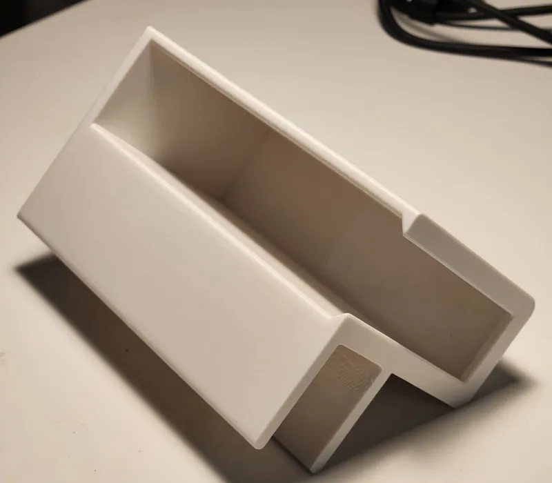 Laptop power brick holder