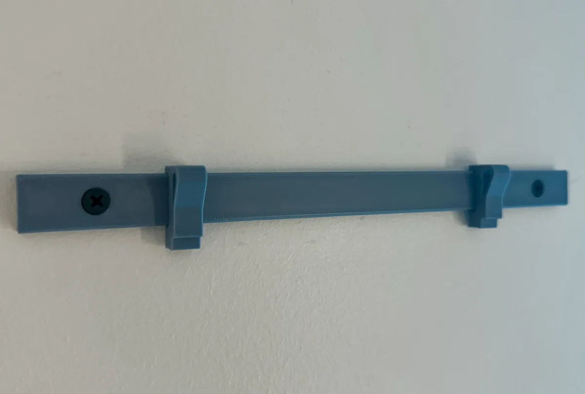 Rail mural avec clips pour affiches