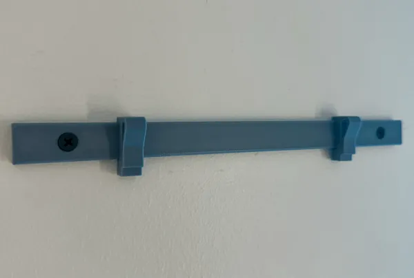 Rail mural avec clips pour affiches