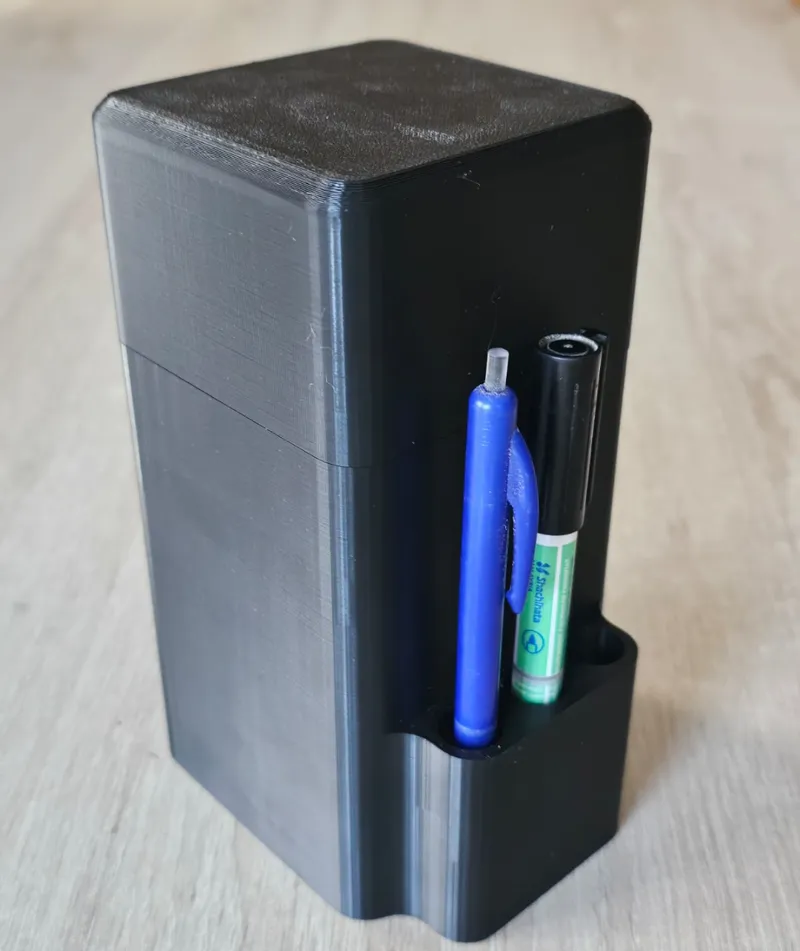 Box with pen holder
