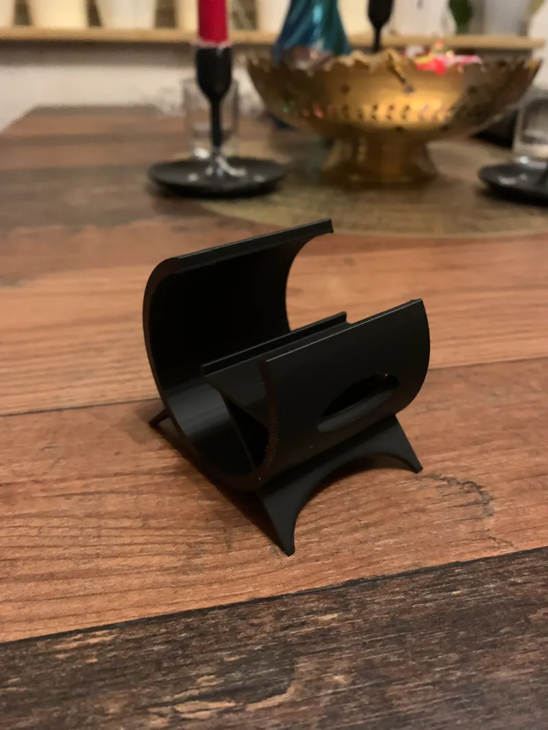 Phone stand with cable hole