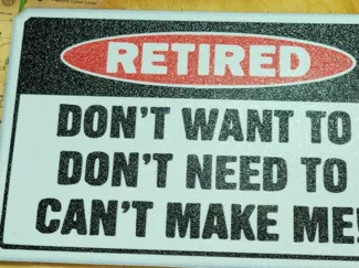 retired sign face down needs ams