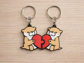 Llaveros Nutrias con Corazón – Set de Pareja