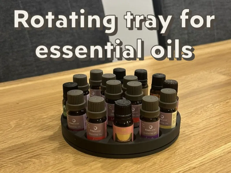 Rotating tray for essential oils with ball bearing