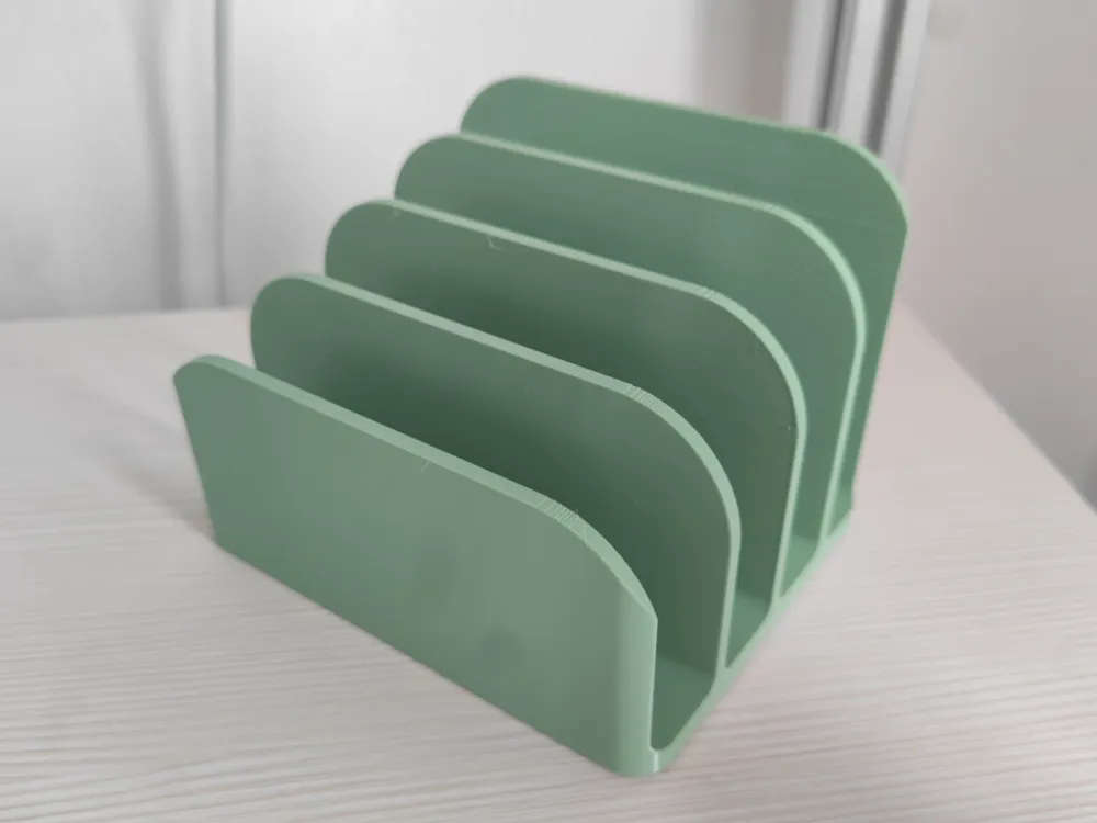 Soporte: Parametric Envelope Holder. Referencia del modelo original.