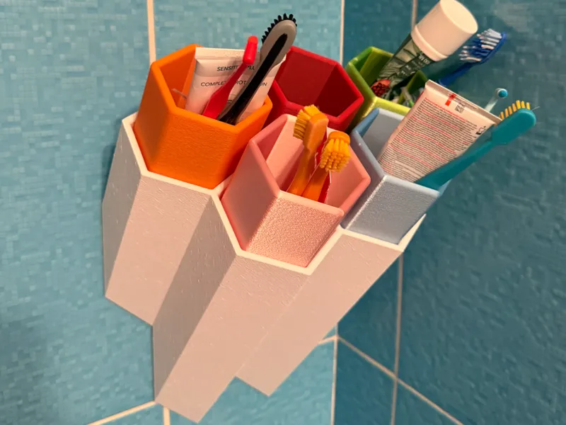 Toothbrush/pencil cup wall/table holder