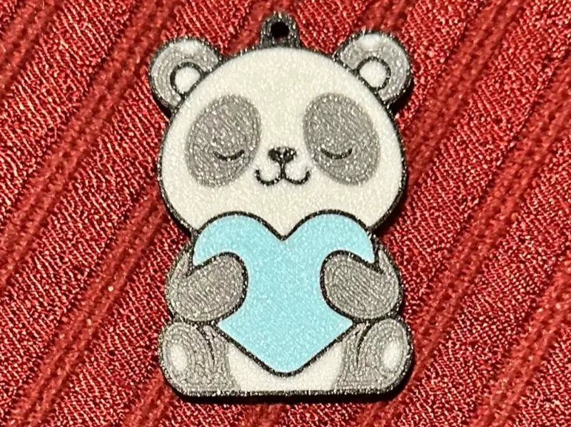 Cute Panda holding heart keychain