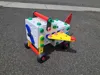 Ride on airplane building set with brims for adhesion
