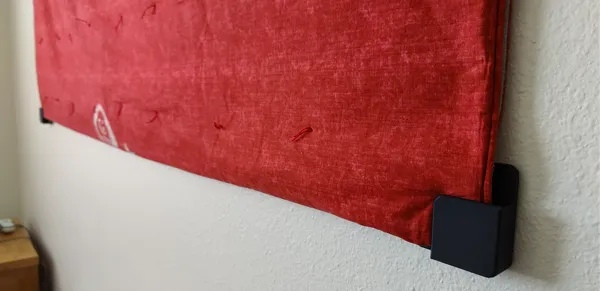 Plaques d'angle pour suspendre un plaid