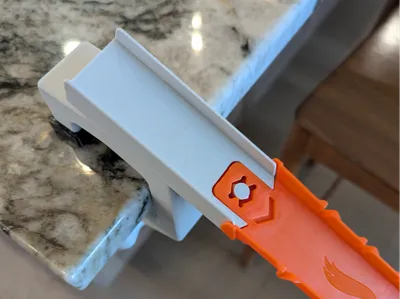 Starting Clamp compatible with 1/64 scale tracks