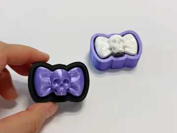 Objeto manipulable: Skull Bow Clicker — vista de referencia 5