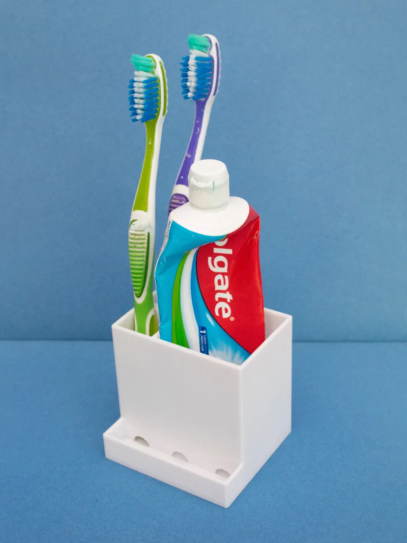 Storage for 2 toothbrushes and toothpaste