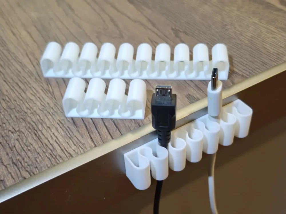 Soporte: Universal cable holders. Referencia del modelo original.