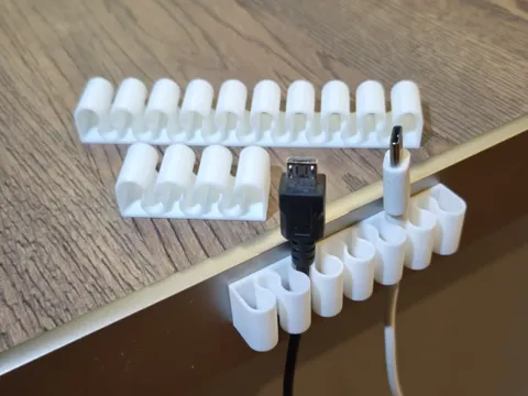 Soporte: Universal cable holders — referencia de MakerWorld