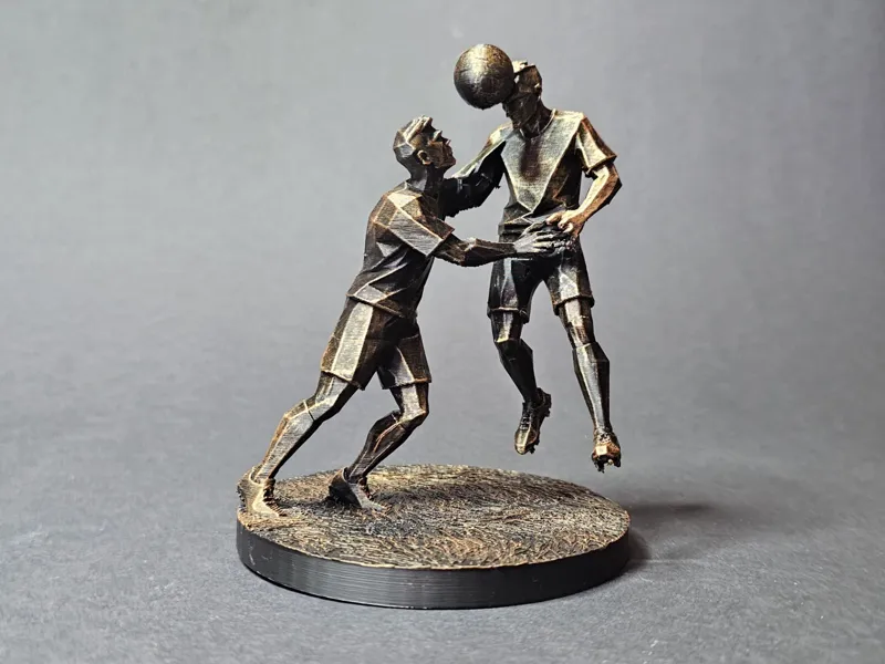 Abstract Low-Poly Sculpture – Football Header Duel