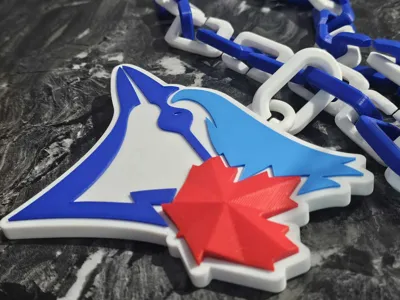 Blue Jays chain with Maple leaf logo extended out.