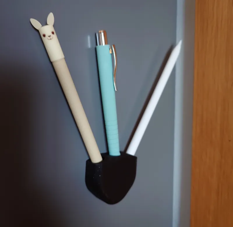 Pen holder with magnets for the fridge
