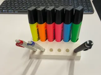 Pen / highlighter holder