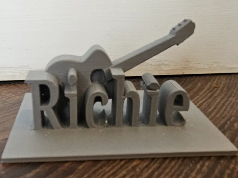 Statue of Guitar With Name