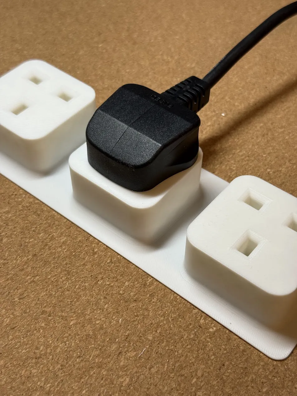 UK plug holders (3 plugs) - Free 3D Print Model - MakerWorld