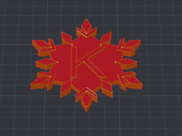 Monogramed snow flake with a k in the middle