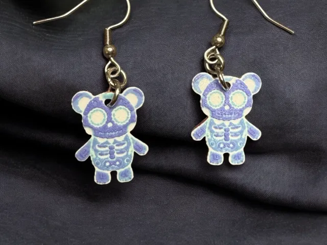 Tiny Skellington teddy bear earrings, Hueforge