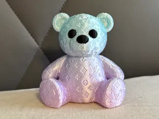 Niedlicher Teddy im Designer-Look – Dekofigur