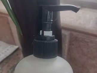 Liquid soap limiting clip for Meyers hand soap